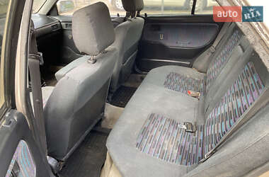 Седан Mazda 323 1996 в 