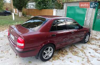 Седан Mazda 323 1999 в 