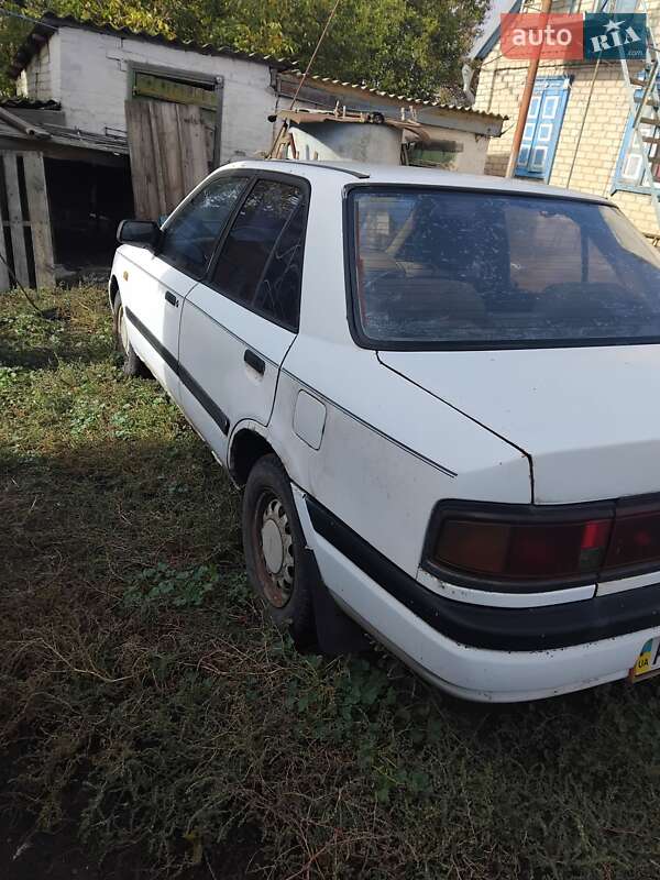 Седан Mazda 323 1991 в Солоному фото 7 Седан Mazda 323 1991 в Солоному