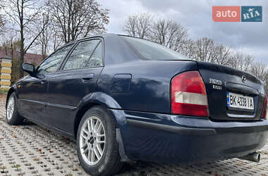 Седан Mazda 323 1999 в 