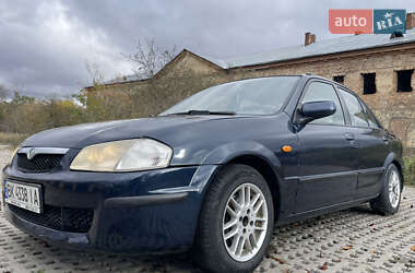 Седан Mazda 323 1999 в 