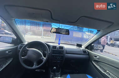 Седан Mazda 323 1997 в 