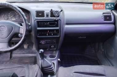 Седан Mazda 323 1998 в  фото 8 Седан Mazda 323 1998 в