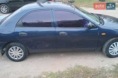 Седан Mazda 323 1998 в  фото 5 Седан Mazda 323 1998 в