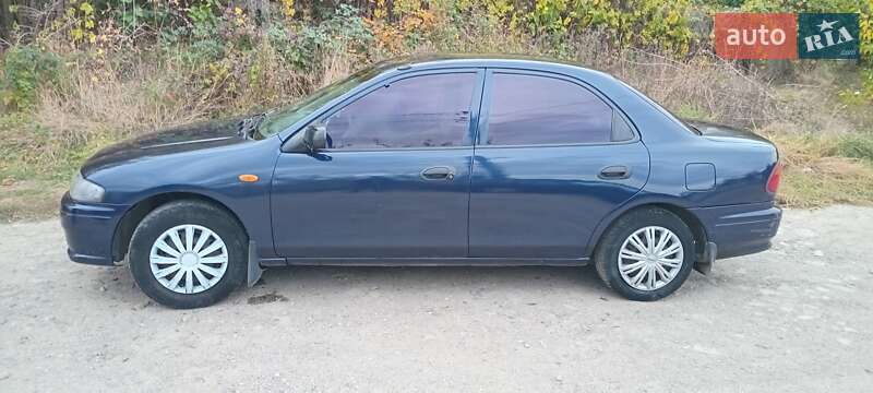 Седан Mazda 323 1998 в Дніпрі фото 2 Седан Mazda 323 1998 в Дніпрі