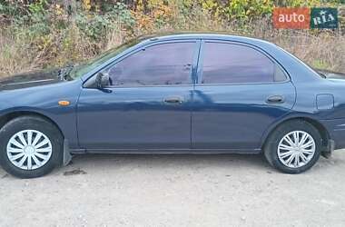Седан Mazda 323 1998 в  фото 2 Седан Mazda 323 1998 в