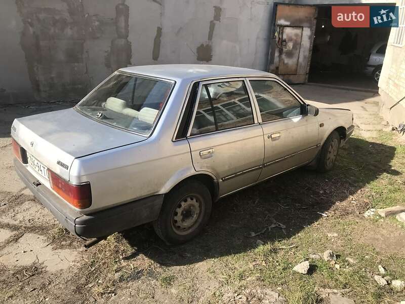 Седан Mazda 323 1987 в Буче фото 2 Седан Mazda 323 1987 в Буче