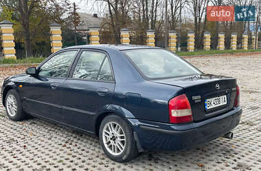 Седан Mazda 323 1999 в  фото 4 Седан Mazda 323 1999 в