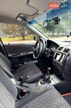 Хэтчбек Mazda 323 2001 в  фото 8 Хэтчбек Mazda 323 2001 в