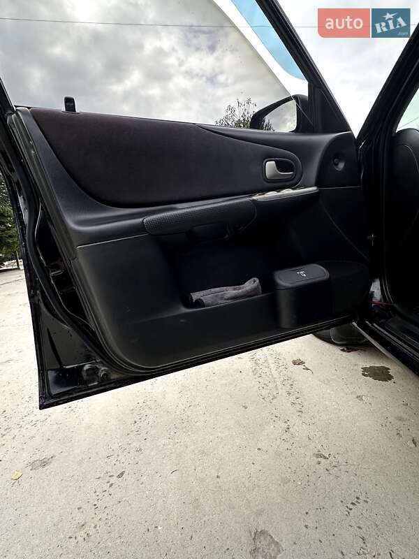 Хетчбек Mazda 323 2001 в Самборі фото 18 Хетчбек Mazda 323 2001 в Самборі