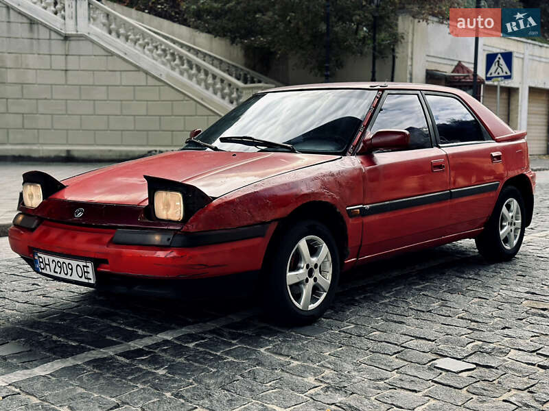 Седан Mazda 323 1990 в Одессе фото 3 Седан Mazda 323 1990 в Одессе