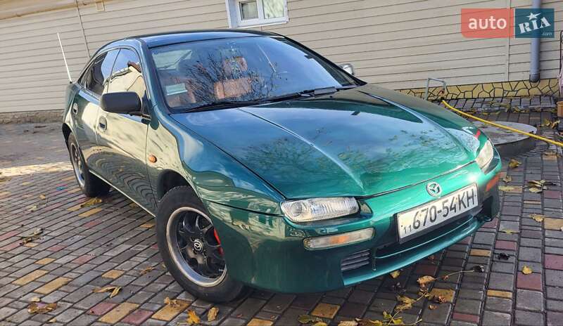 Хетчбек Mazda 323 1998 в Подільську фото 10 Хетчбек Mazda 323 1998 в Подільську