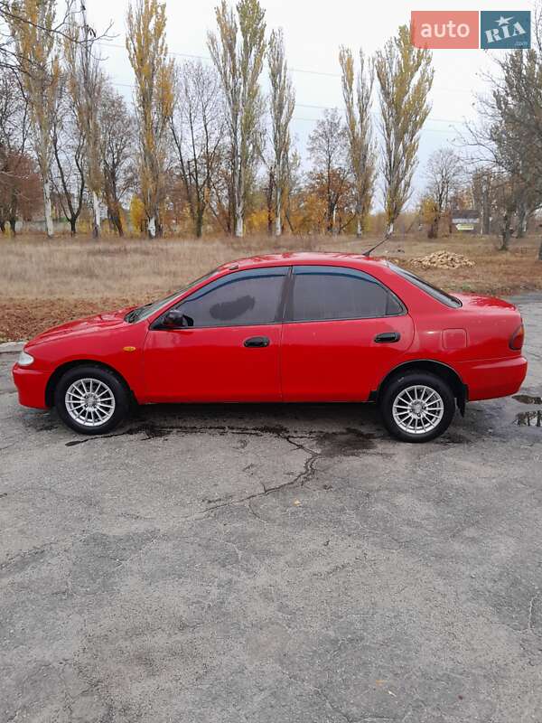 Седан Mazda 323 1996 в Синельниково фото 3 Седан Mazda 323 1996 в Синельниково