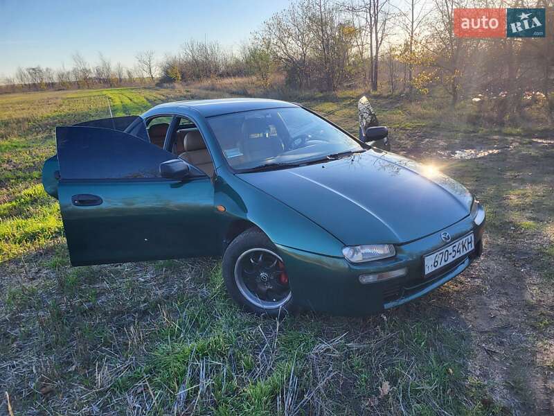 Хэтчбек Mazda 323 1998 в Подольске фото Хэтчбек Mazda 323 1998 в Подольске