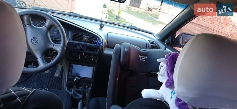 Седан Mazda 323 1996 в Коломые фото 2 Седан Mazda 323 1996 в Коломые