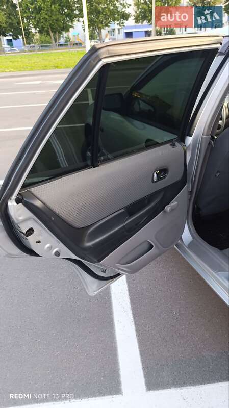 Хетчбек Mazda 323 2003 в Чернігові фото 15 Хетчбек Mazda 323 2003 в Чернігові