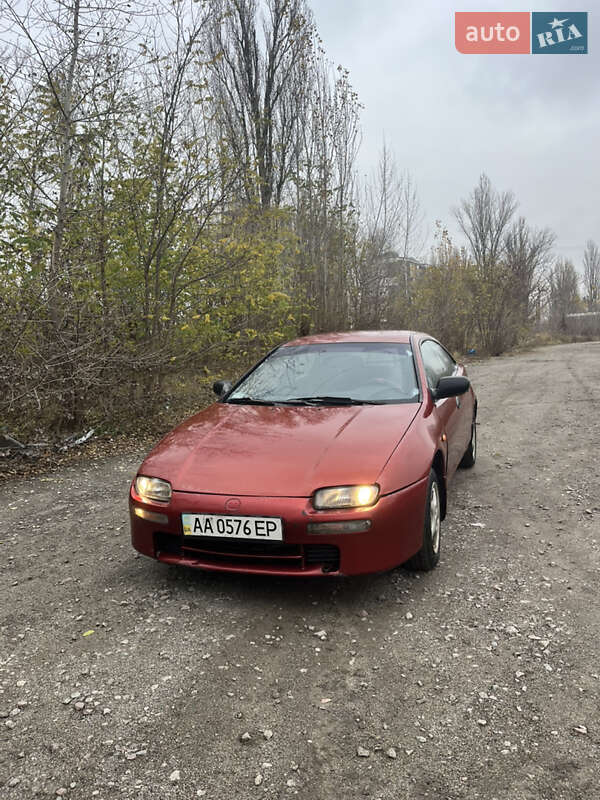 Хэтчбек Mazda 323 1994 в Вышгороде фото 10 Хэтчбек Mazda 323 1994 в Вышгороде