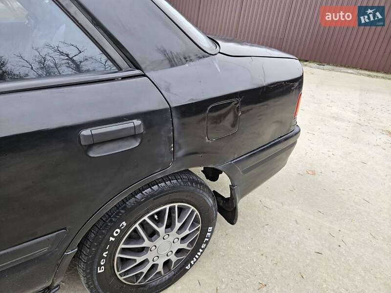 Седан Mazda 323 1995 в Обухове фото 16 Седан Mazda 323 1995 в Обухове