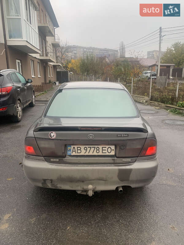 Седан Mazda 323 1998 в Виннице