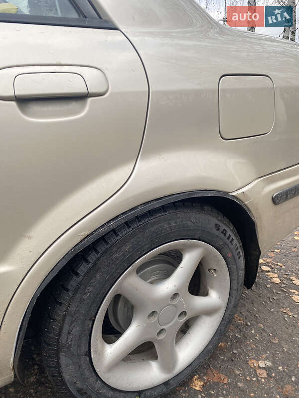 Седан Mazda 323 1999 в Харькове