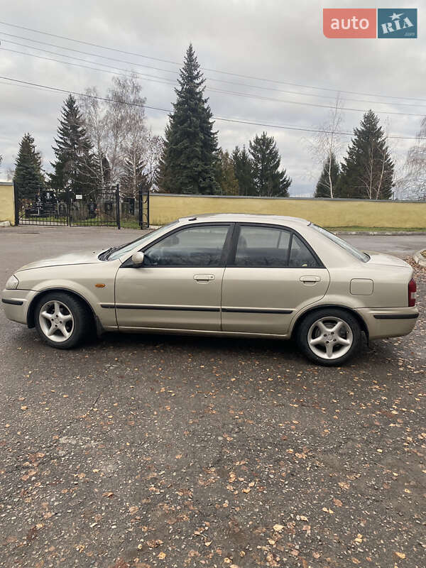 Седан Mazda 323 1999 в Харькове