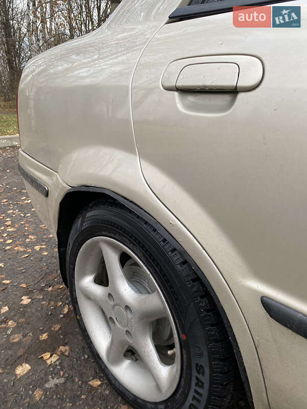 Седан Mazda 323 1999 в Харькове