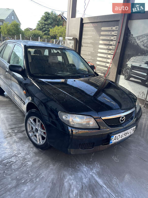 Хетчбек Mazda 323 2003 в Ужгороді фото 4 Хетчбек Mazda 323 2003 в Ужгороді