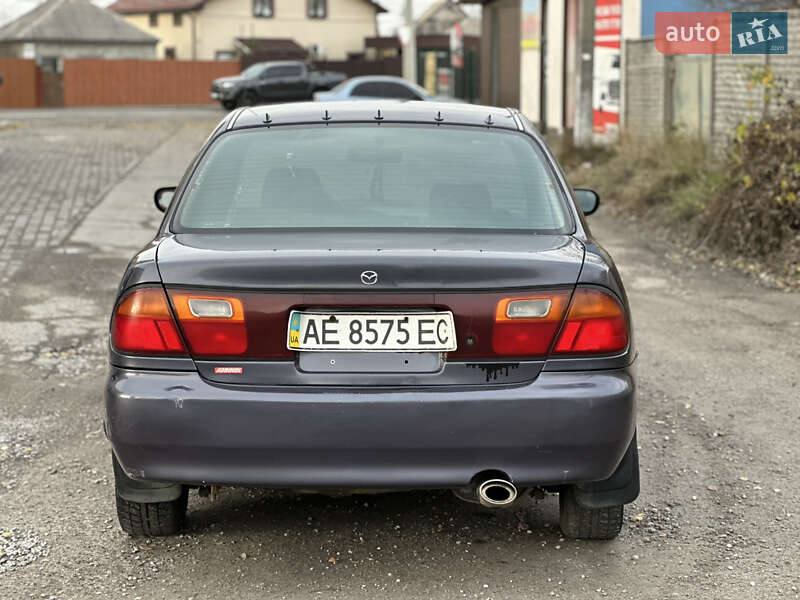 Седан Mazda 323 1994 в Днепре