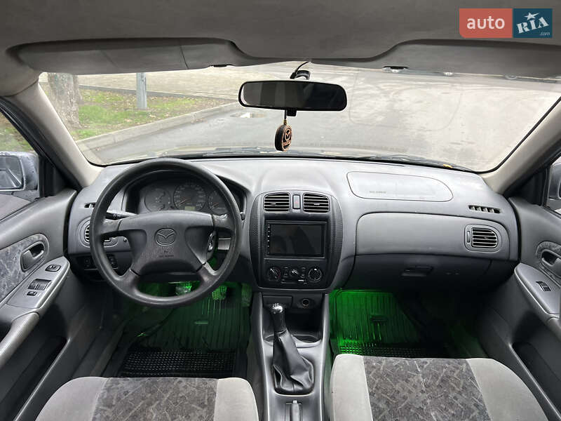 Хетчбек Mazda 323 1999 в Дніпрі фото 7 Хетчбек Mazda 323 1999 в Дніпрі
