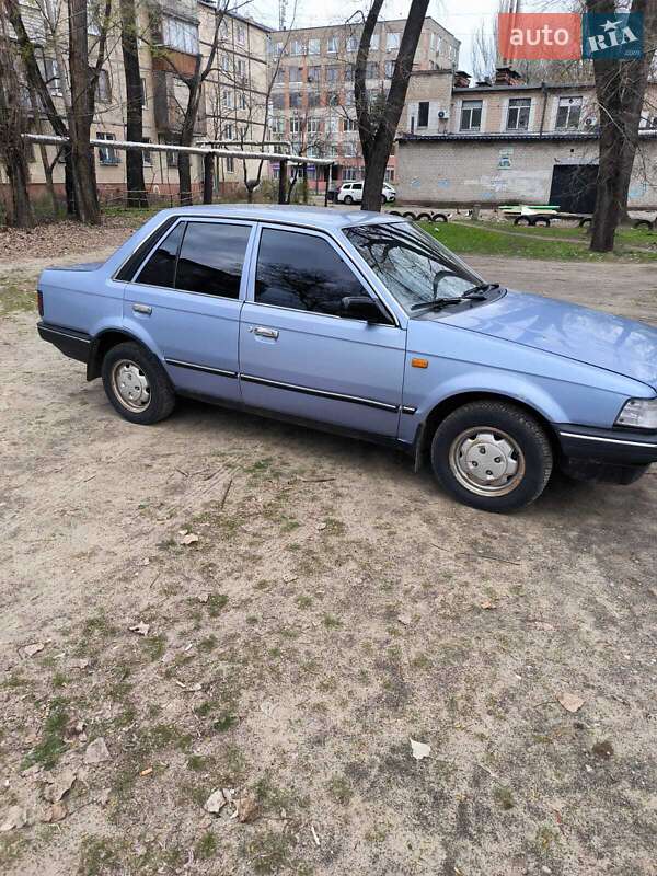 Седан Mazda 323 1988 в Близнюках фото 3 Седан Mazda 323 1988 в Близнюках