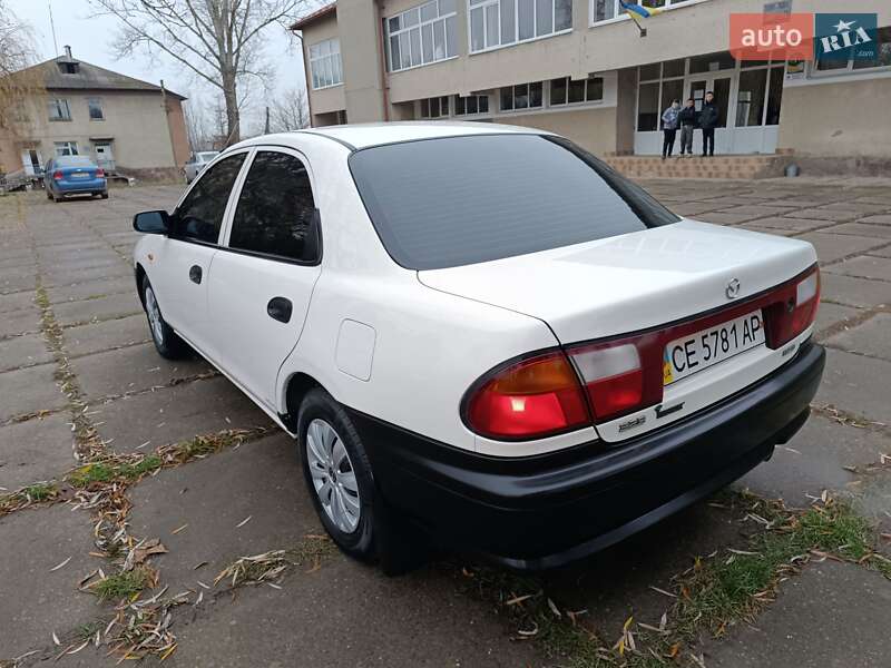 Седан Mazda 323 1998 в Чернівцях фото 13 Седан Mazda 323 1998 в Чернівцях