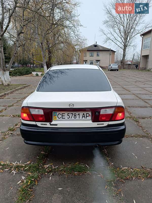 Седан Mazda 323 1998 в Чернівцях фото 11 Седан Mazda 323 1998 в Чернівцях