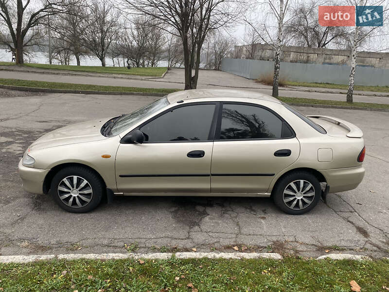 Седан Mazda 323 1996 в Кременчуці фото Седан Mazda 323 1996 в Кременчуці