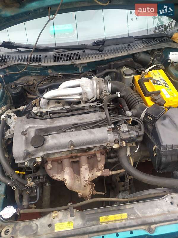 Хэтчбек Mazda 323 1995 в Раздельной