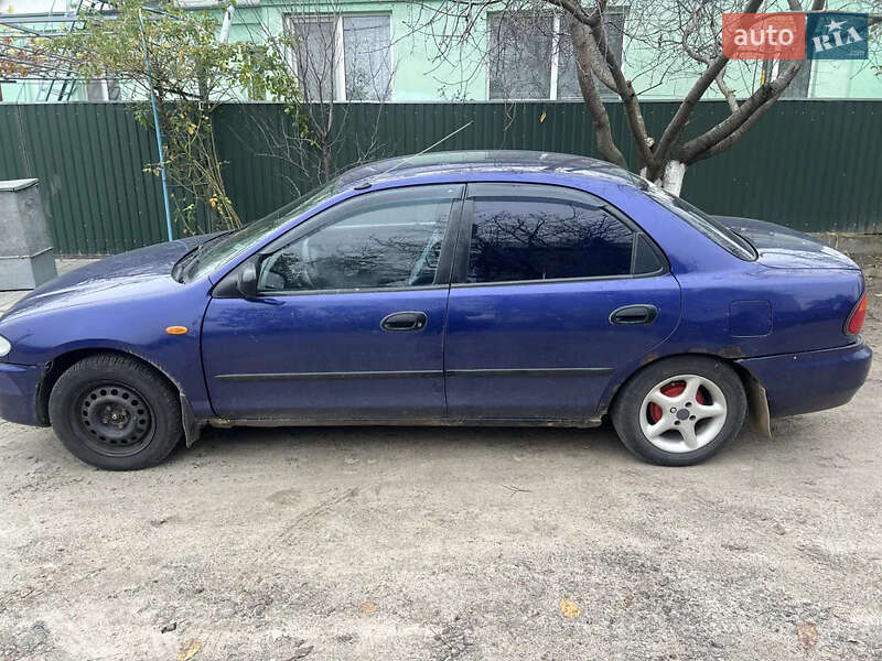 Седан Mazda 323 1995 в Василькове