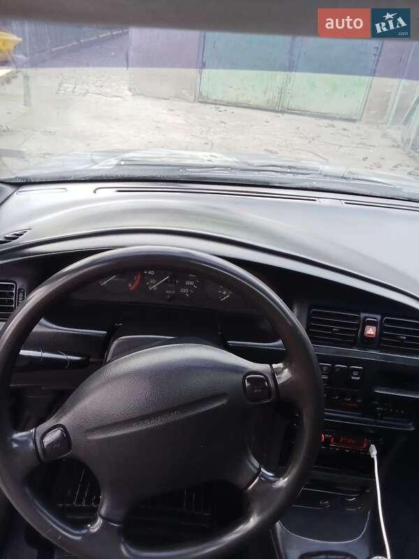Седан Mazda 323 1995 в Одесі фото 3 Седан Mazda 323 1995 в Одесі