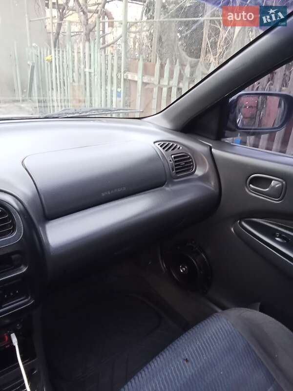 Седан Mazda 323 1995 в Одесі фото 4 Седан Mazda 323 1995 в Одесі