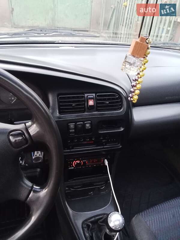 Седан Mazda 323 1995 в Одесі фото 5 Седан Mazda 323 1995 в Одесі