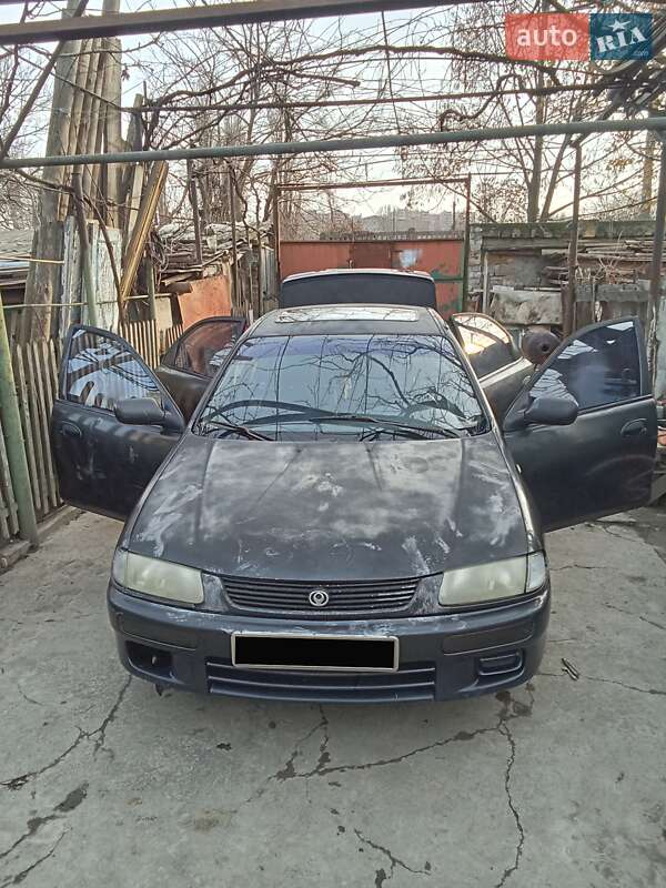Седан Mazda 323 1995 в Одесі фото 6 Седан Mazda 323 1995 в Одесі