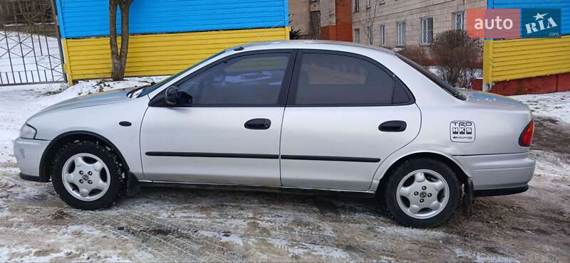 Седан Mazda 323 1997 в Ровно фото 6 Седан Mazda 323 1997 в Ровно