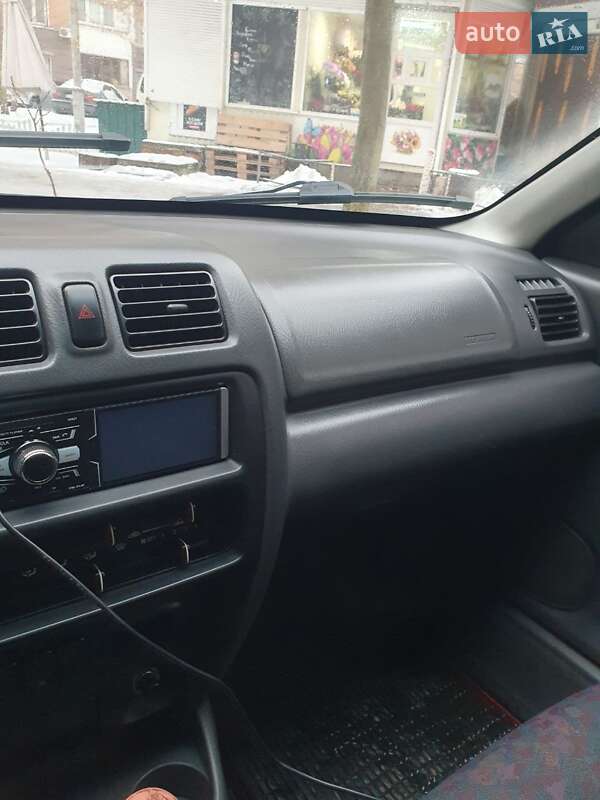 Седан Mazda 323 1998 в Киеве фото 3 Седан Mazda 323 1998 в Киеве