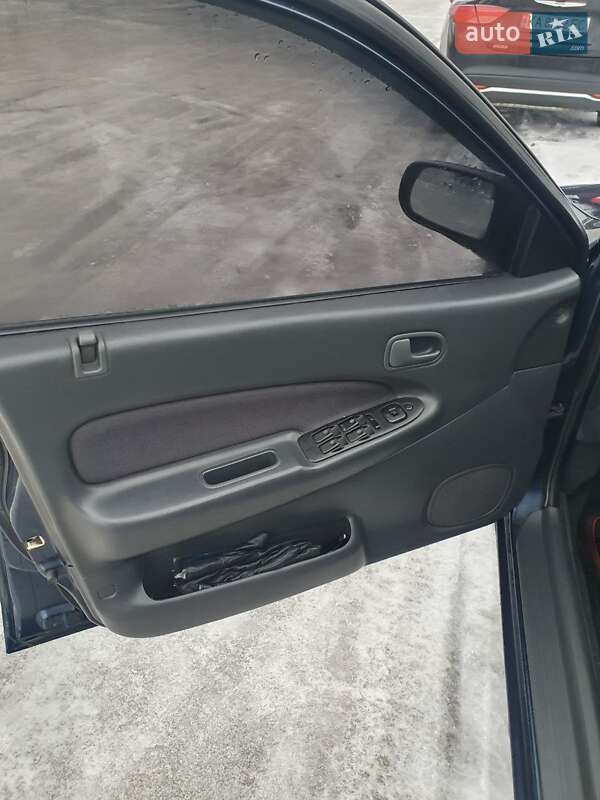 Седан Mazda 323 1998 в Киеве фото 12 Седан Mazda 323 1998 в Киеве
