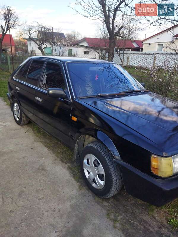 Хетчбек Mazda 323 1987 в Славуті фото Хетчбек Mazda 323 1987 в Славуті