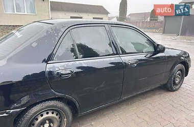 Седан Mazda 323 1999 в Хмельницькому