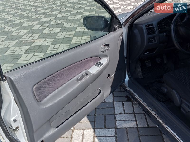 Хэтчбек Mazda 323 1997 в Буске фото 14 Хэтчбек Mazda 323 1997 в Буске