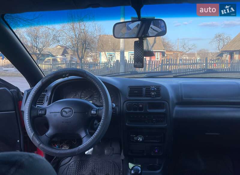Хэтчбек Mazda 323 1998 в Коростене фото 14 Хэтчбек Mazda 323 1998 в Коростене