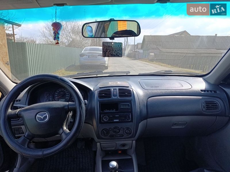 Хэтчбек Mazda 323 2000 в Житомире фото 3 Хэтчбек Mazda 323 2000 в Житомире