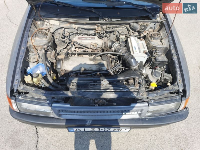 Седан Mazda 323 1991 в Києві фото 13 Седан Mazda 323 1991 в Києві