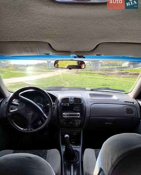 Седан Mazda 323 1998 в Вознесенске