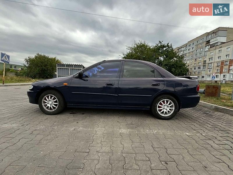 Седан Mazda 323 1997 в Шептицькому фото 9 Седан Mazda 323 1997 в Шептицькому